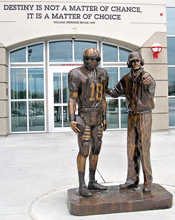 Brook Berringer and Tom Osborne statue